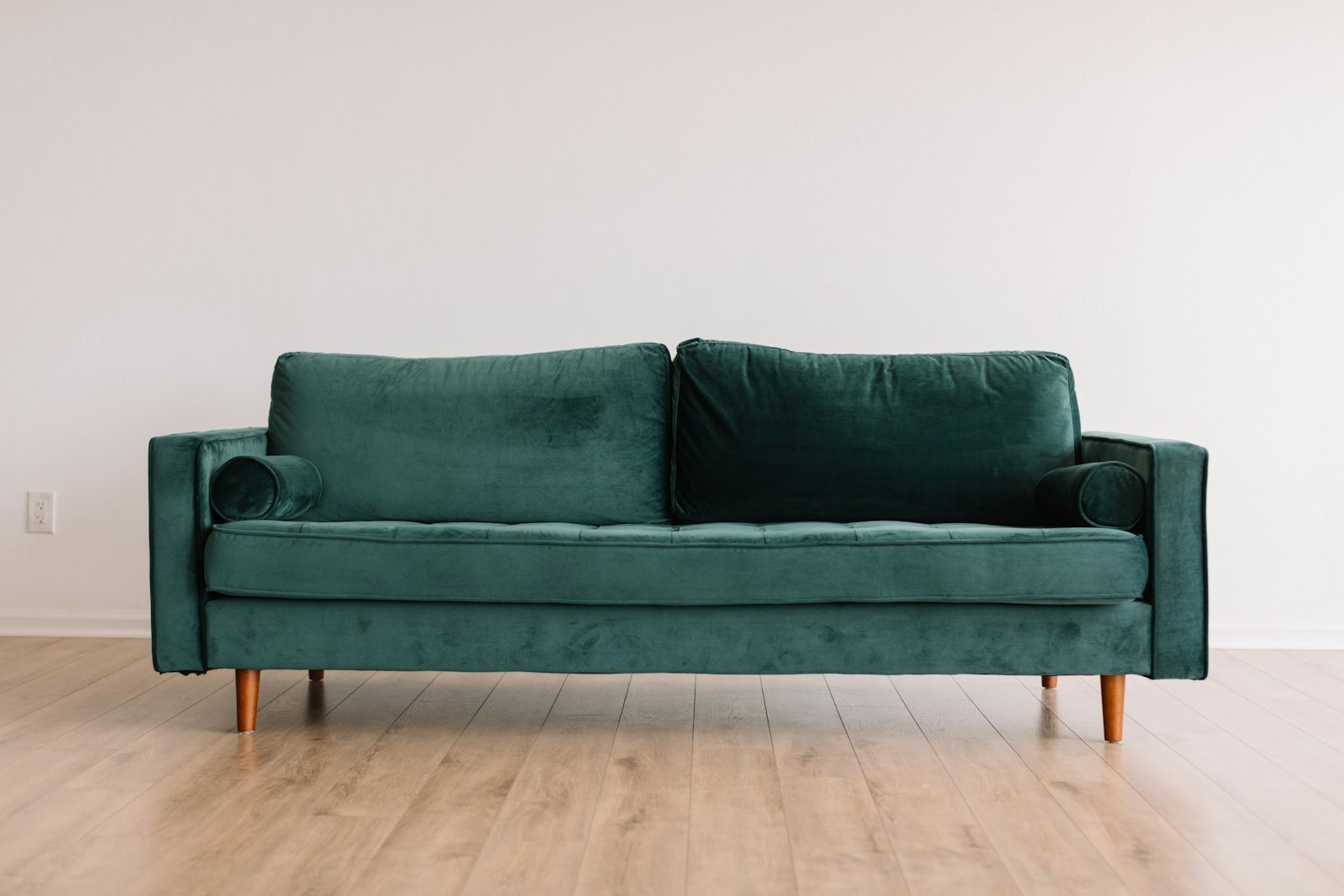 Modern gray couch in a bright minimalist living room