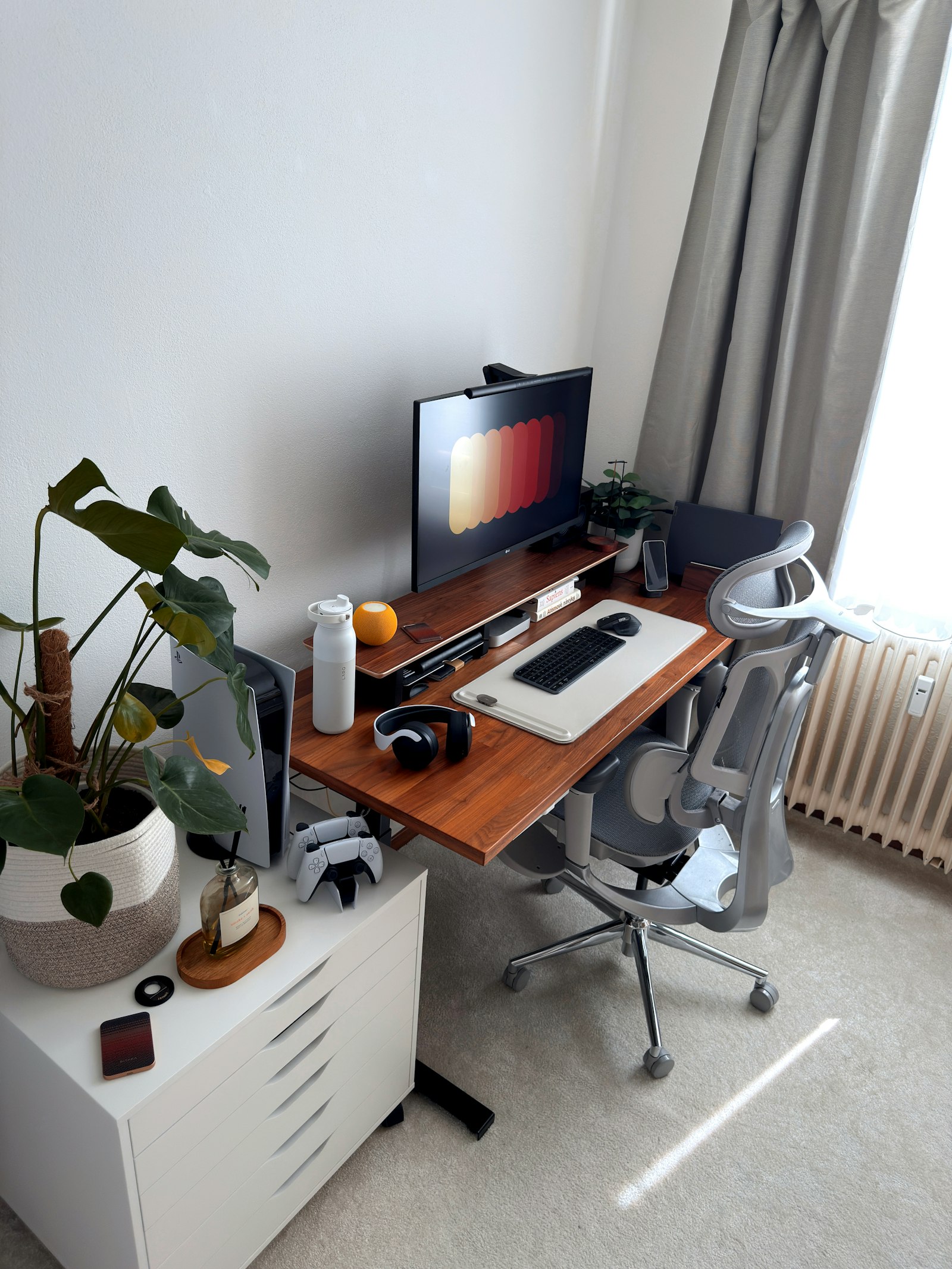 Modern home office desk setup with computer and chair