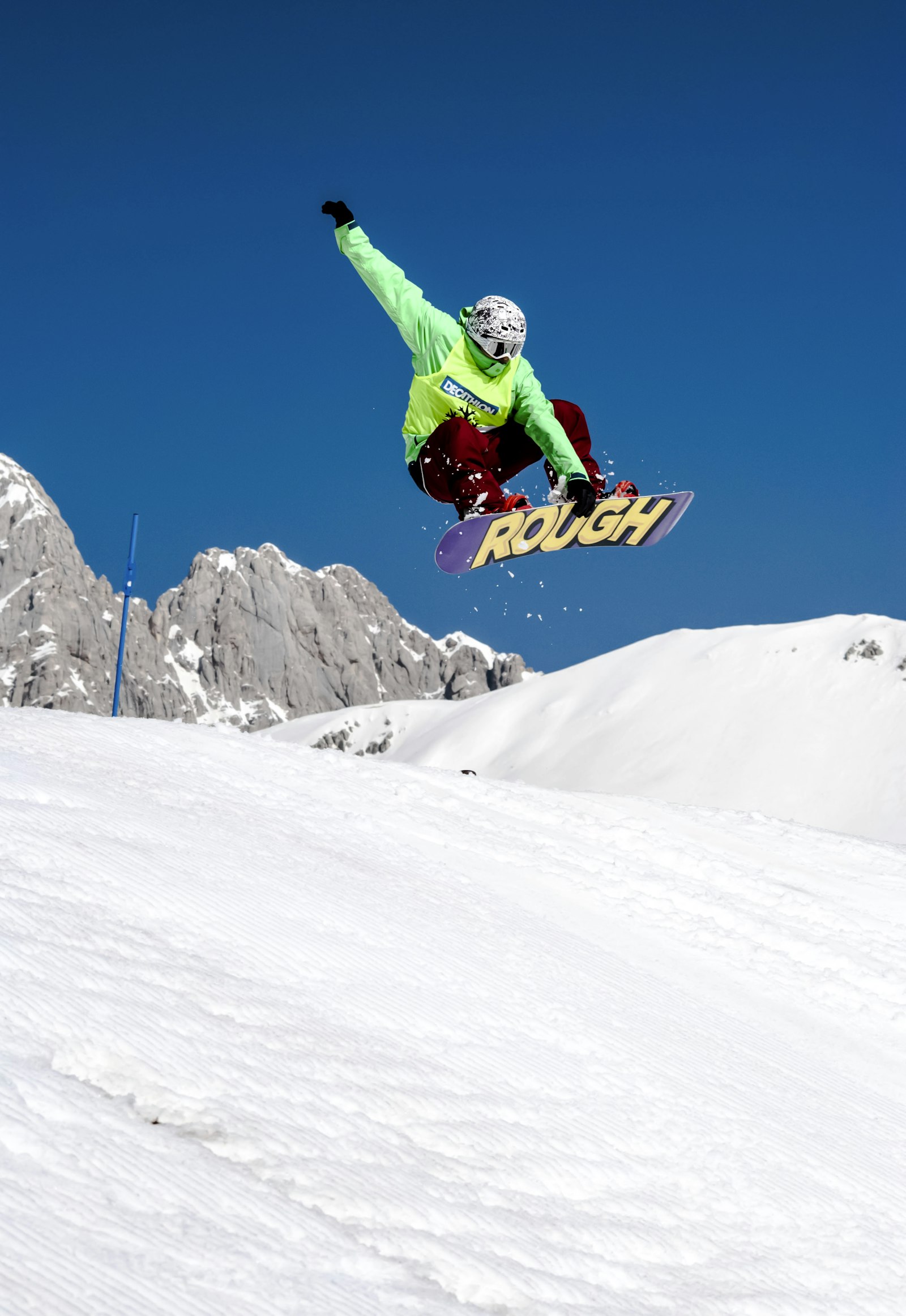 Snowboarder on a snow-covered mountain